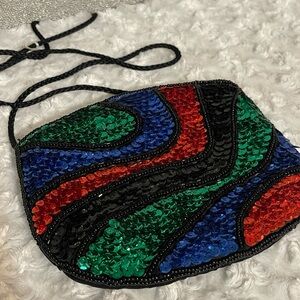 Vibrant Sequin Evening Bag with Wavy Design
